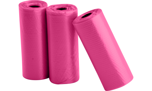 Drie rollen van 15 roze hondenpoepzakken, duurzaam en lekbestendig, ideaal voor schone en gemakkelijke afvalverwerking.